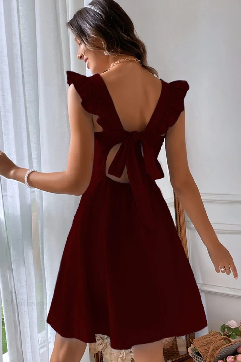 Carmen ärmelloses Minikleid mit Rüschenschleife am Rücken