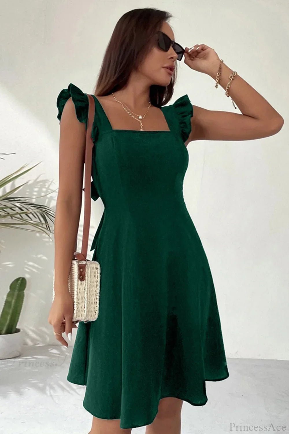 Carmen ärmelloses Minikleid mit Rüschenschleife am Rücken