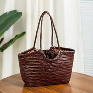 Petra Handgeflochtene Kunstledertasche